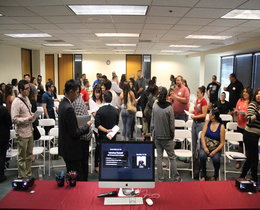 Students at orientation standing and talking